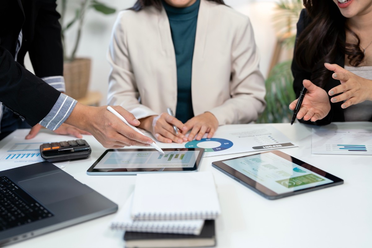 Healthcare professionals reviewing electronic claims and financial reporting for medical billing and revenue cycle management services in virginia beach and across the united states