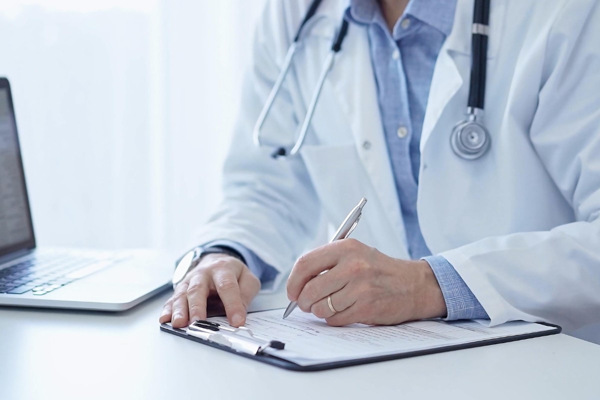Medical consulting experts reviewing practice data near suffolk